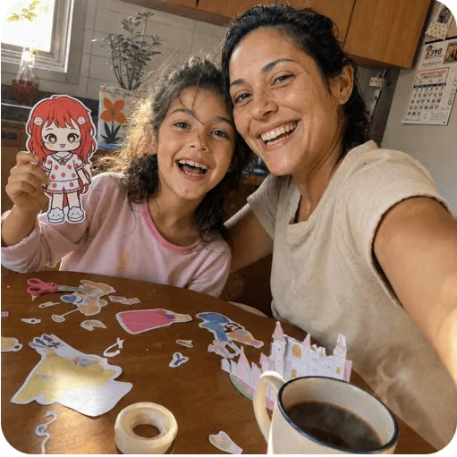 Girl playing with paper dolls