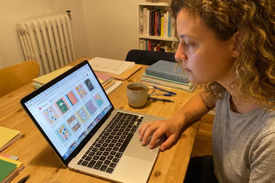 She finds her designs and opens her email