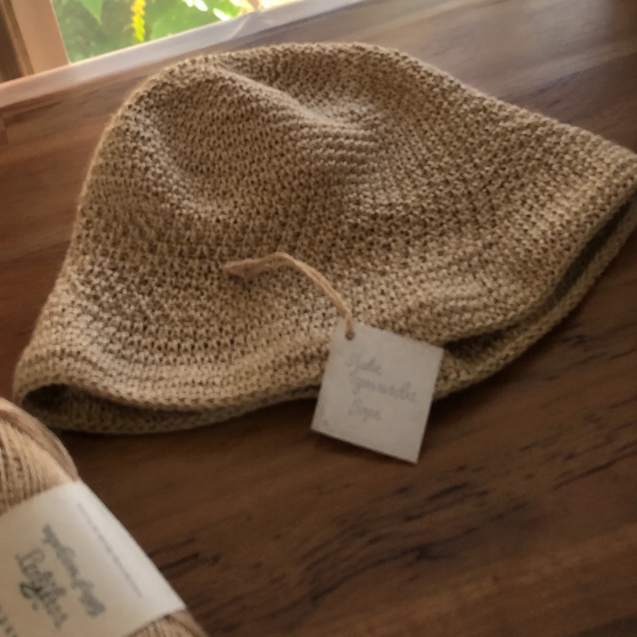 Handmade crochet piece with a price tag